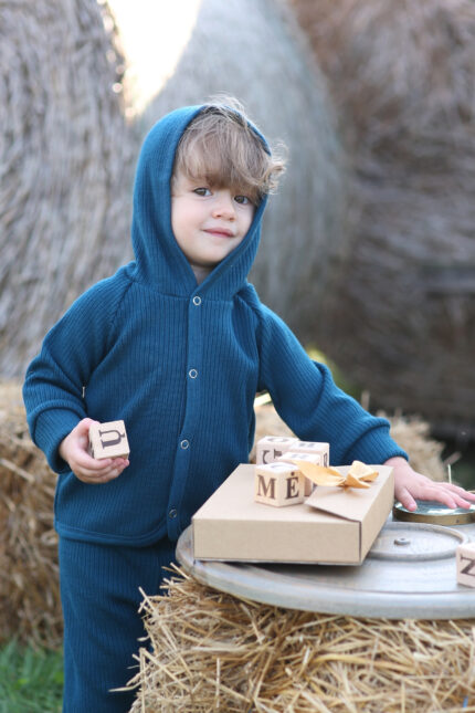 Baby jumper with hood in knitted merino wool